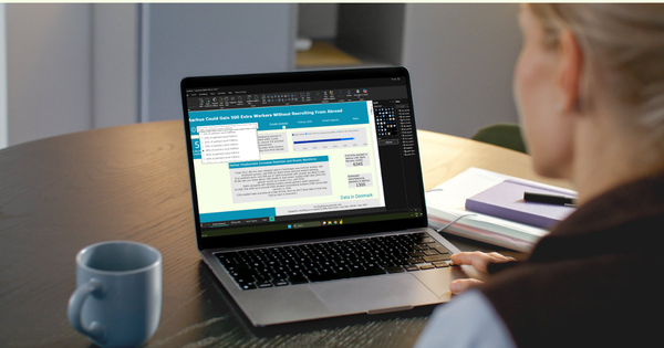Power BI report on Aarhus labour market data open on a laptop
